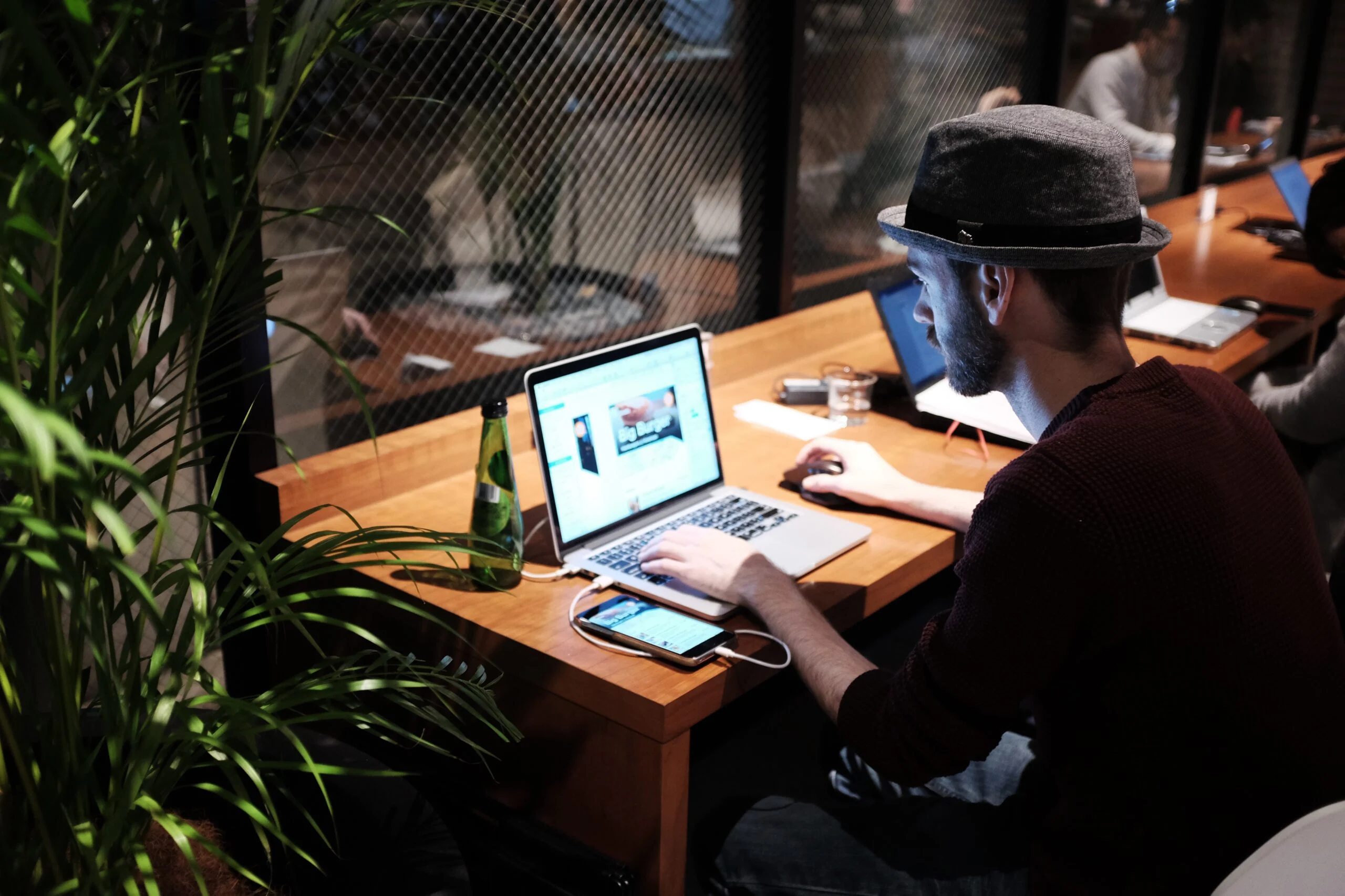 picography man macbook desk wood hat alex knight 1 scaled